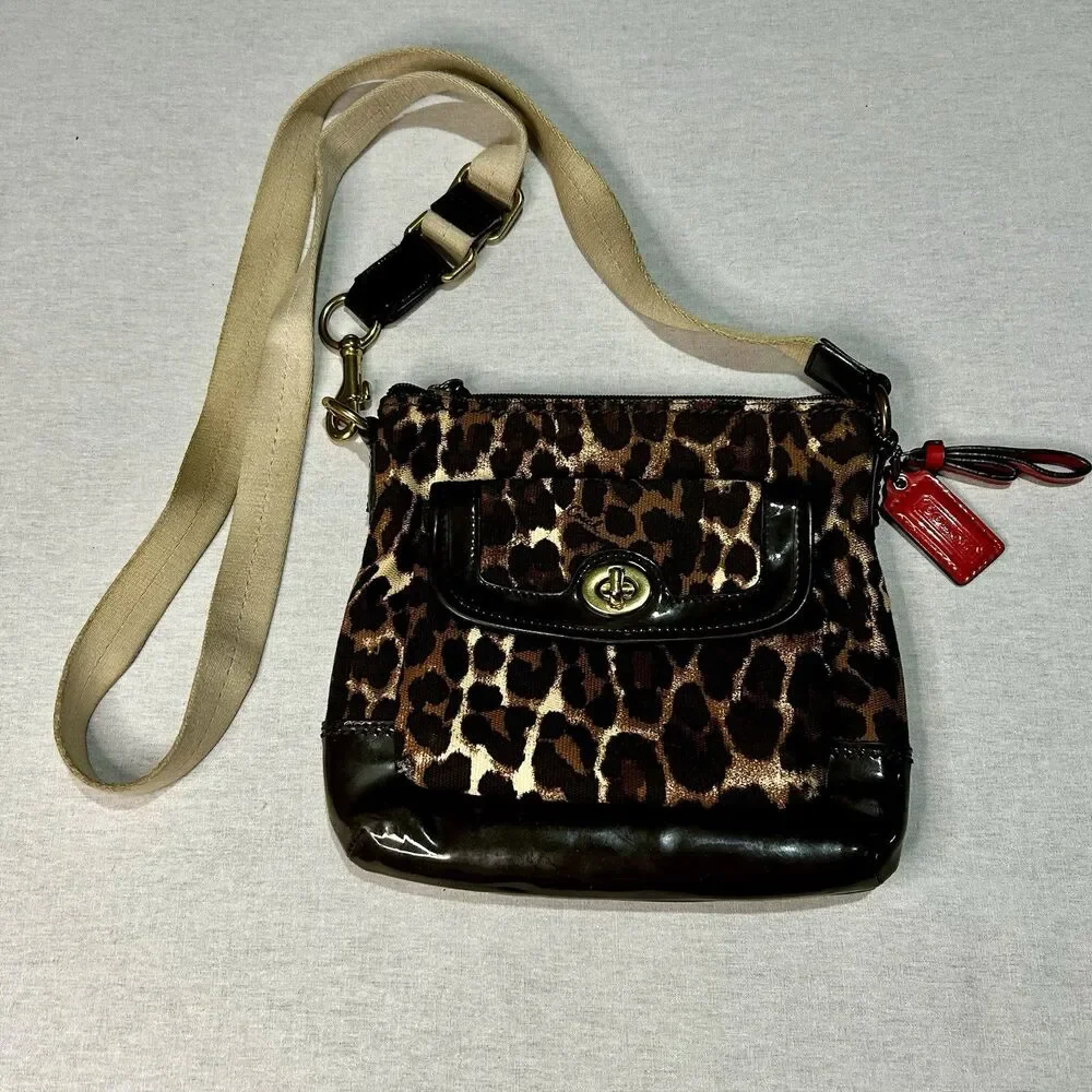 Coach Vintage Ocelot Swingpack crossbody bag with a leopard print exterior